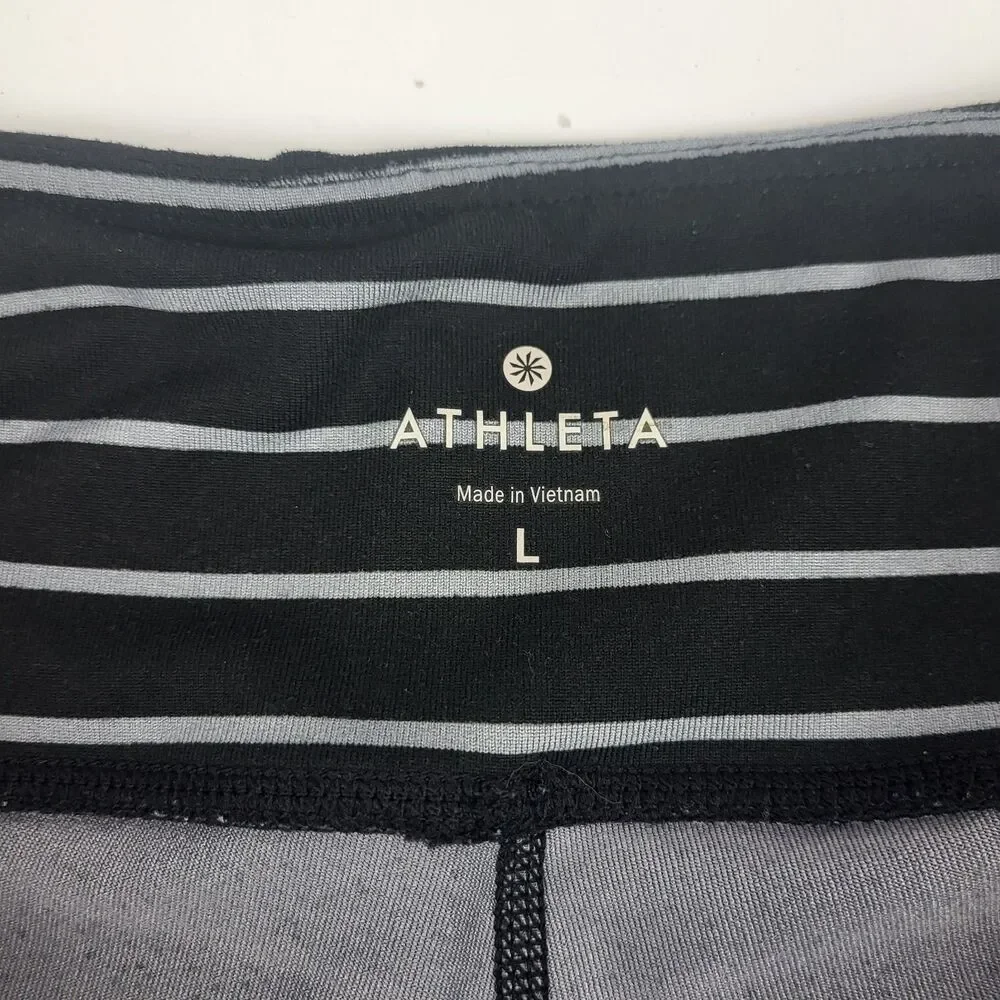 Athleta Striped Chaturanga Capri Leggings High rise Size large Black